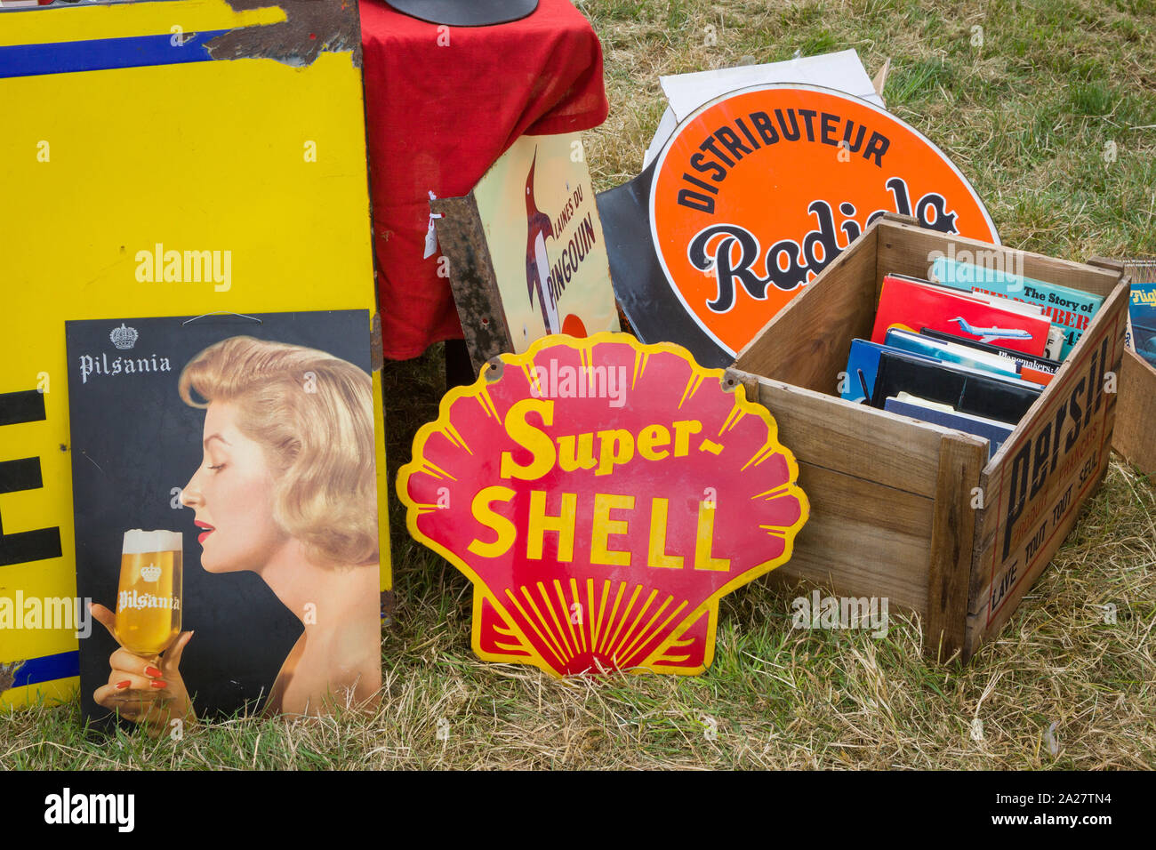 A Super Shell enamel sign for sale amongst classic car automobilia Stock Photo