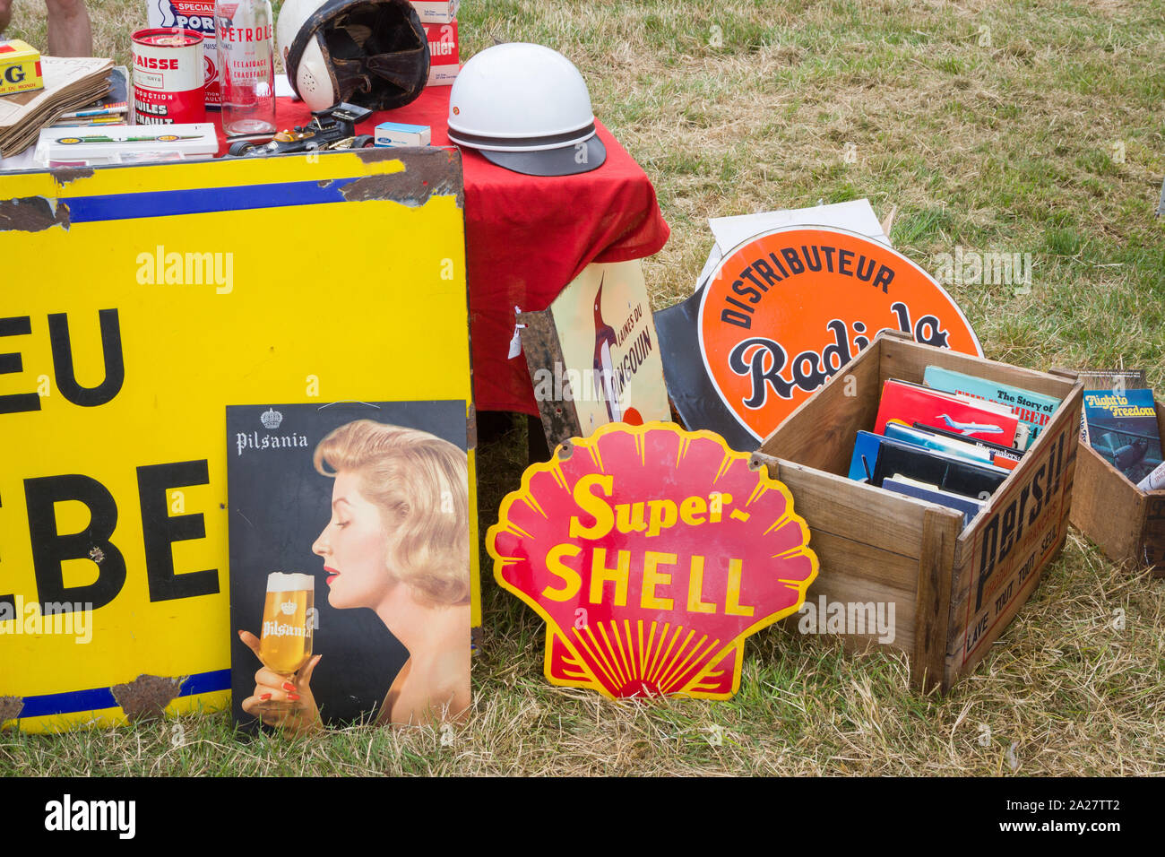 A Super Shell enamel sign for sale amongst classic car automobilia Stock Photo