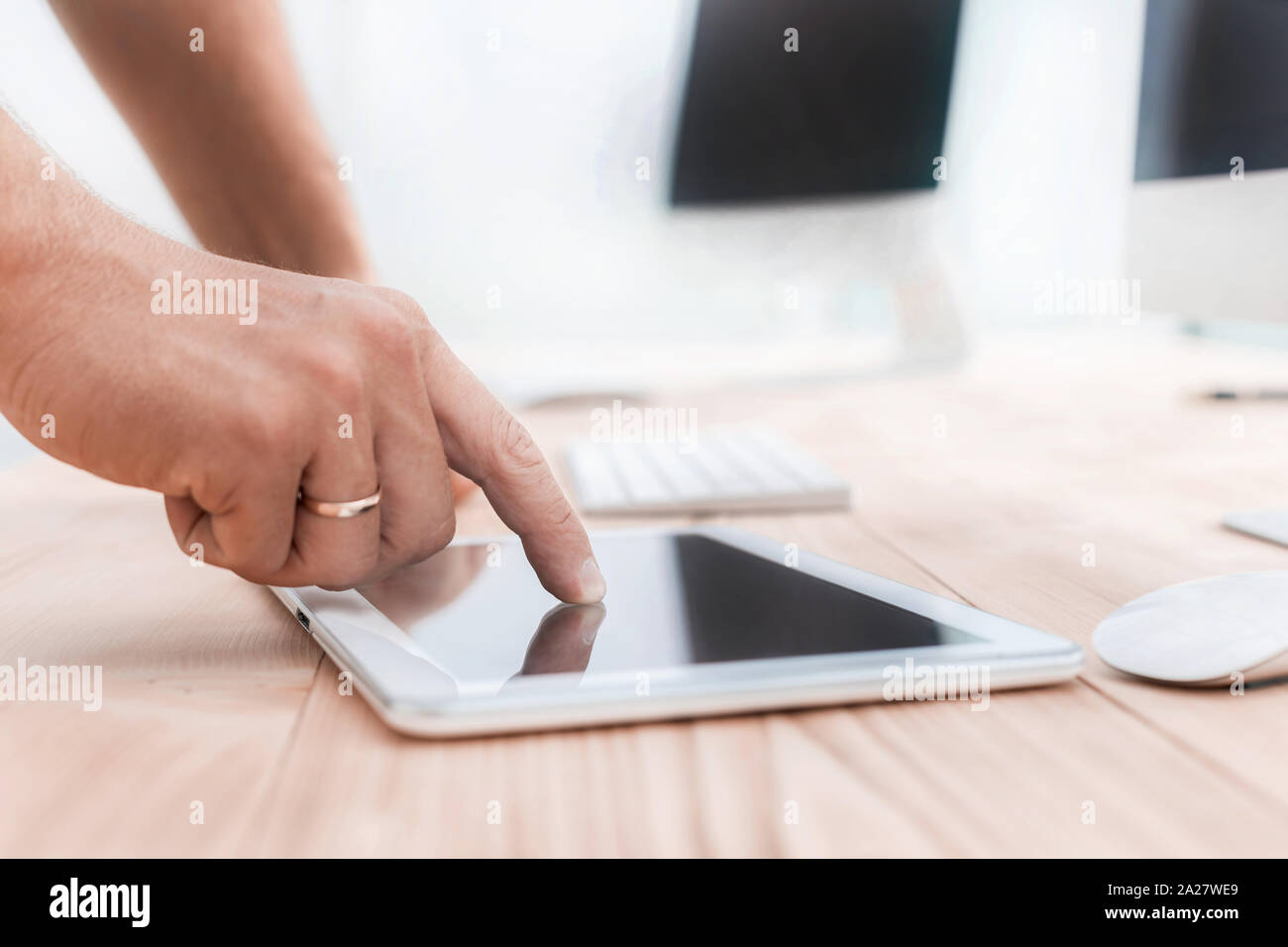 cropped image of man using a digital tablet. Stock Photo