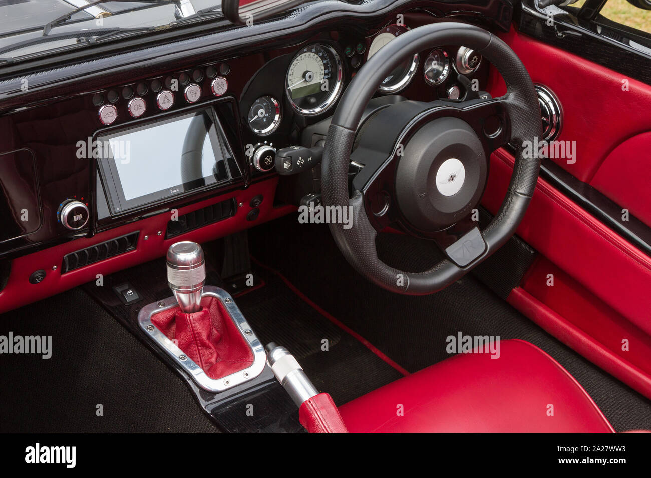 The interior of a modern Morgan Sports car with electronic screen Stock Photo
