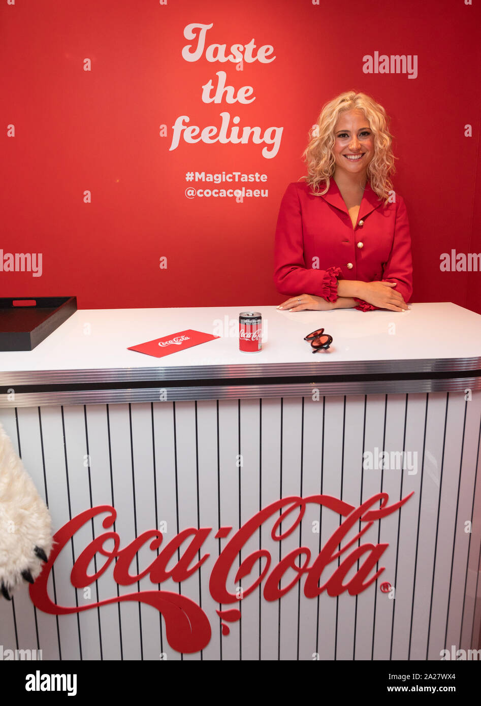 Pixie Lott surprises attendees at Coca-Cola's Ultimate Photo Booth in