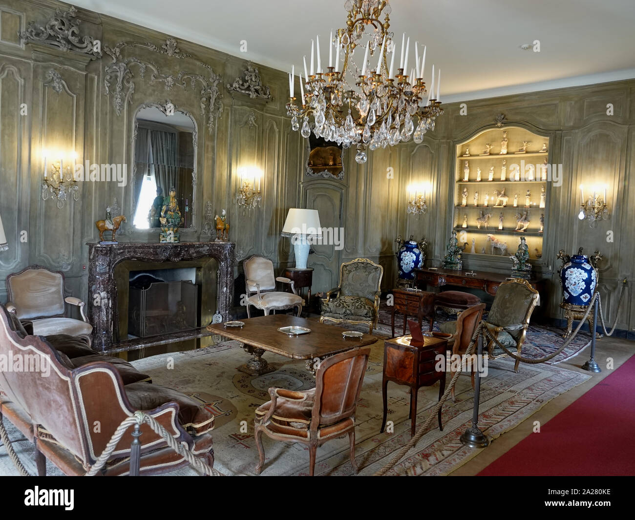 Lake Como, Lombardy, Italy.  Guest room housing both French and English 18th and 19th Century furniture and collectables,  at the Villa del Balbianell Stock Photo