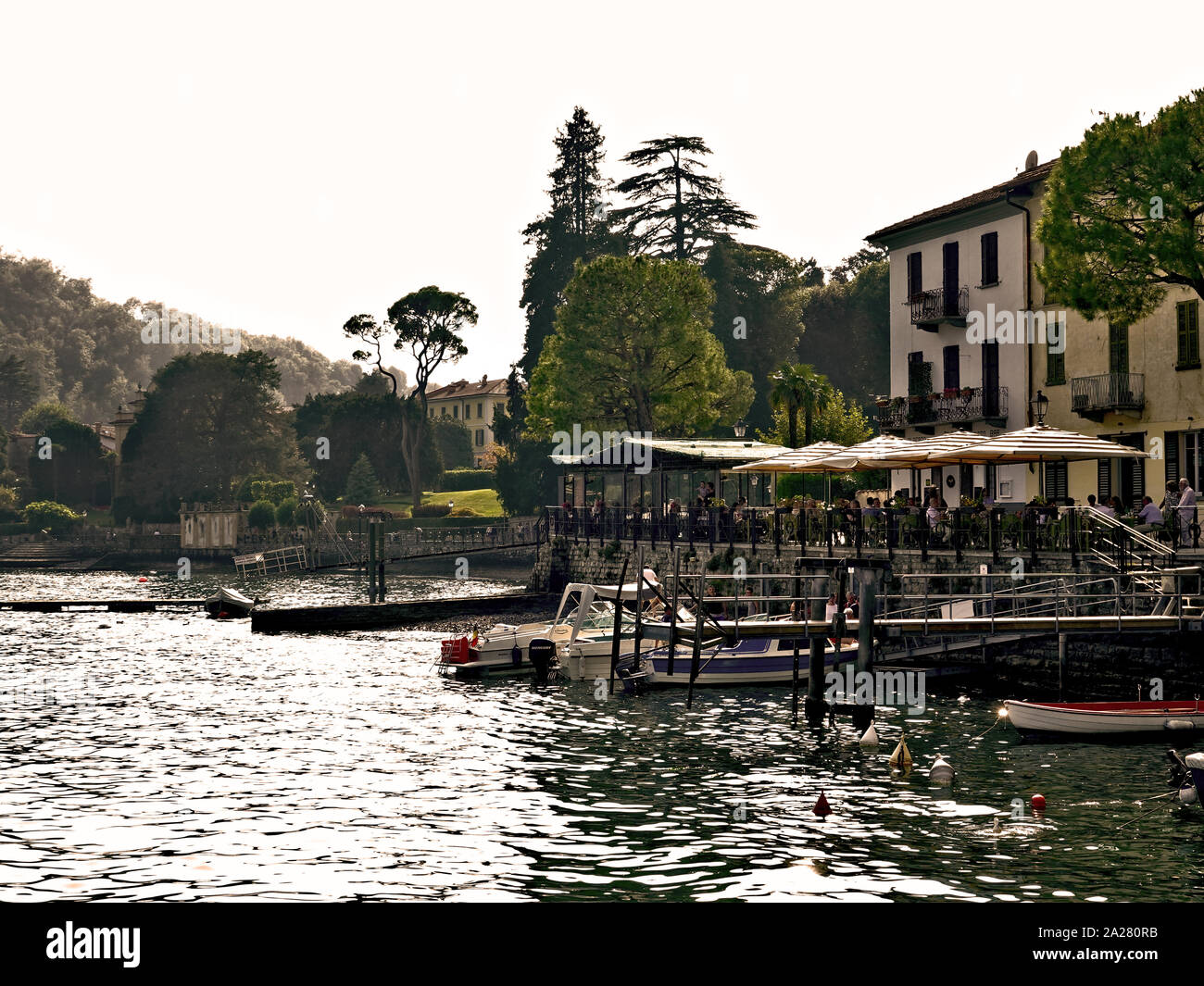 Lake Como, Lombardy, Italy Lake front restaurant in Lenno, near the famous Villa del Balbianello. Stock Photo