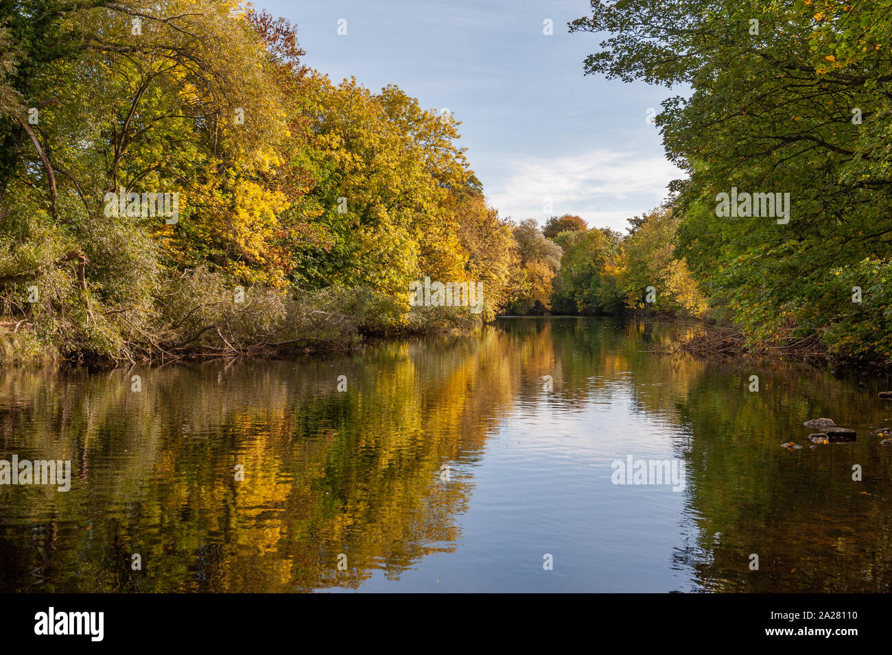 Autumn reflections on the Wharfe Stock Photo