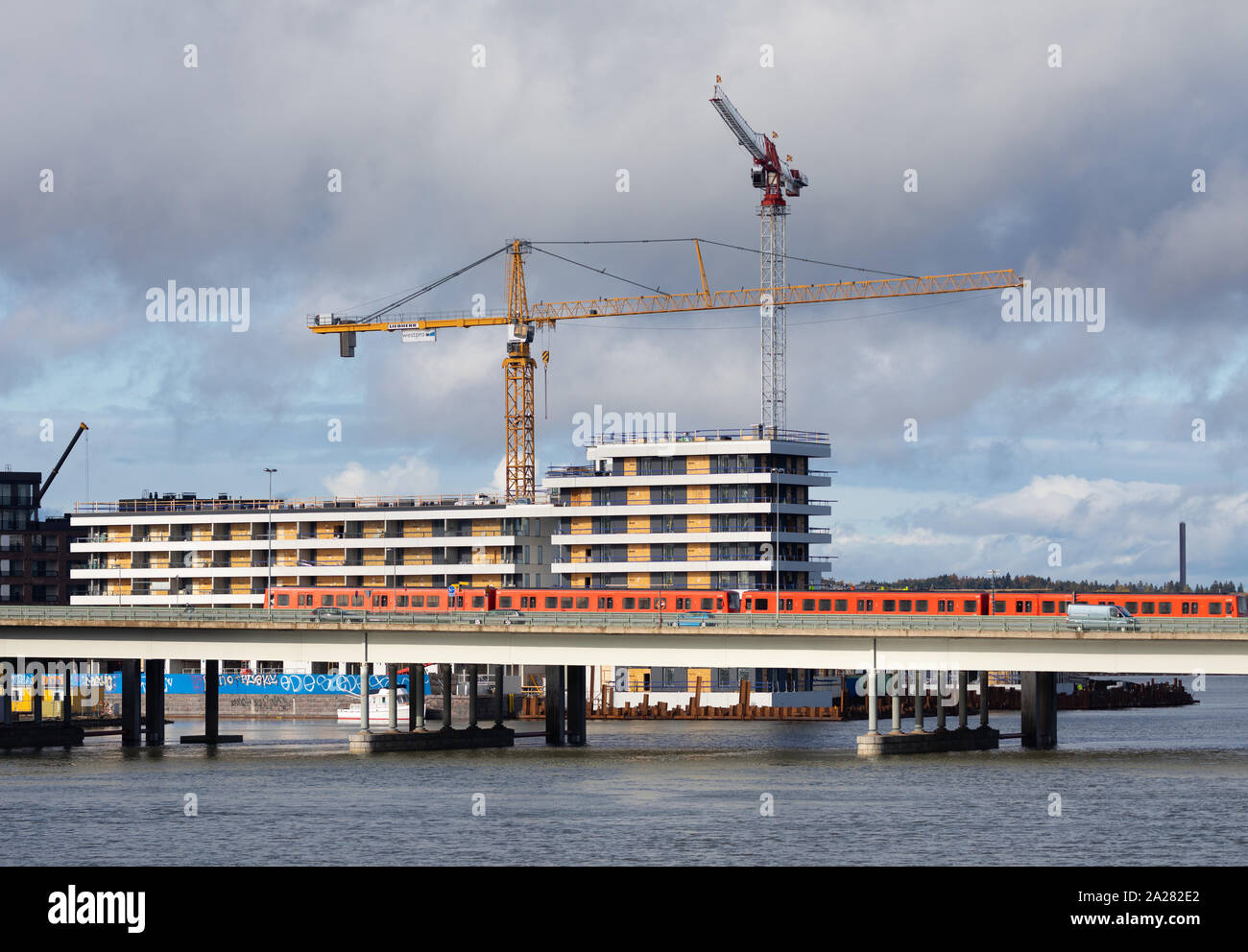 Construction work proceeds actively at the new Kalasatama business and residential area of Helsinki, Finland. Stock Photo