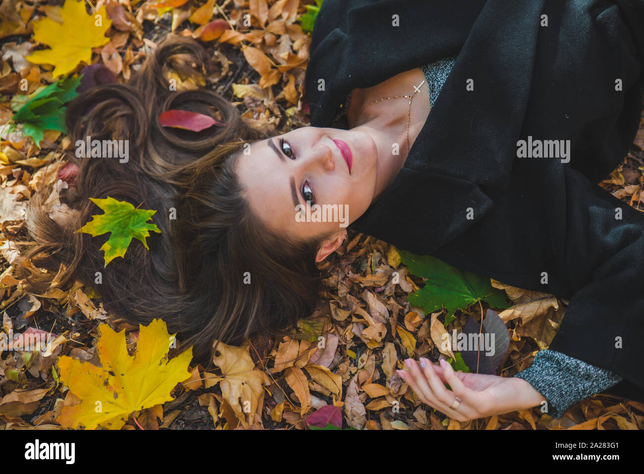 Caucasian woman laying on the ground hi-res stock photography and ...