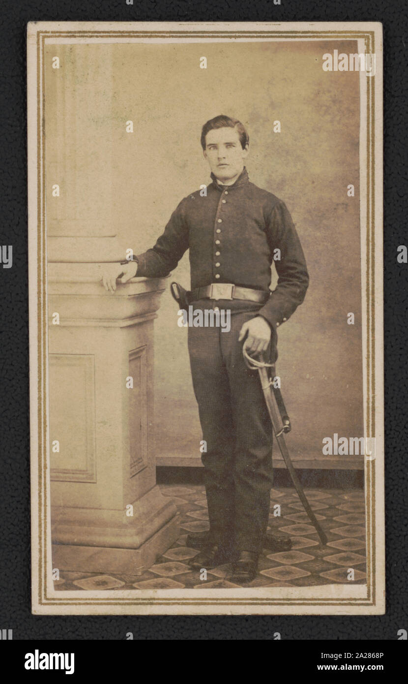 Private James S. Bendle of 6th Michigan Cavalry Regiment in uniform with saber Stock Photo