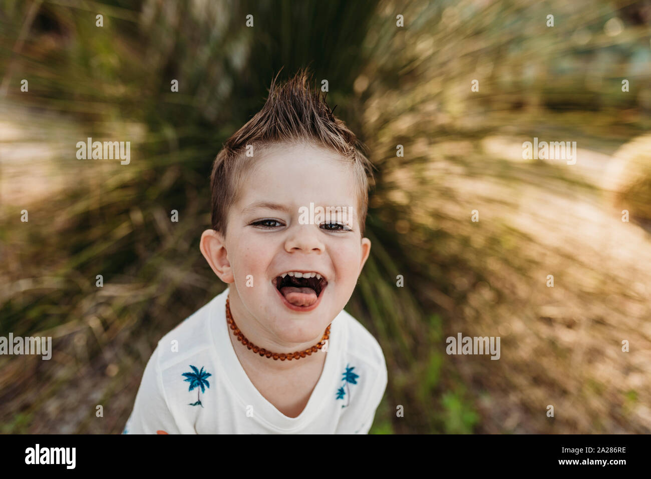 Close up portrait of cute young toddler boy with smiling Stock Photo ...