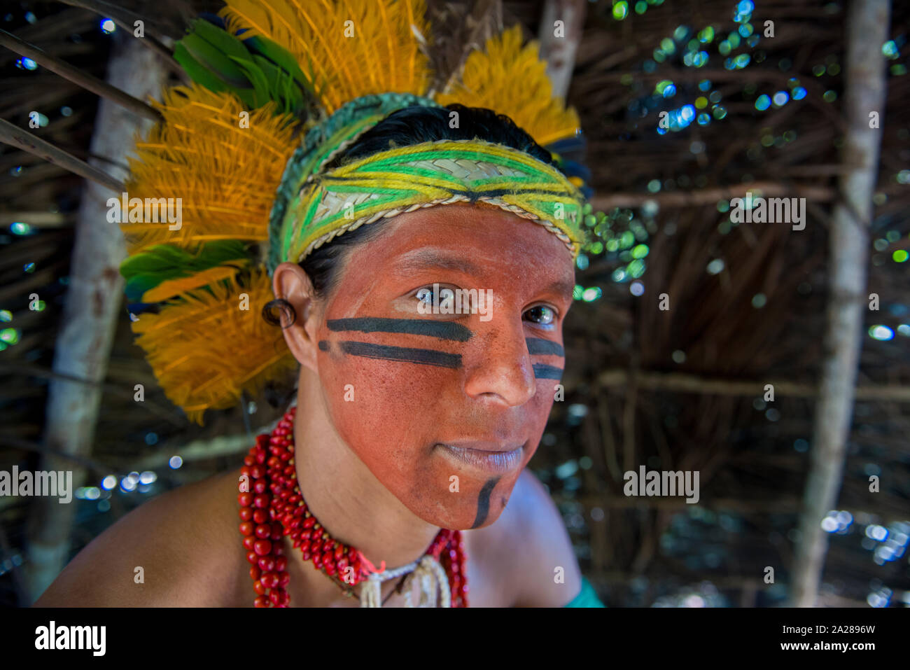 Indigenous with face painting and traditional clothes Stock Photo