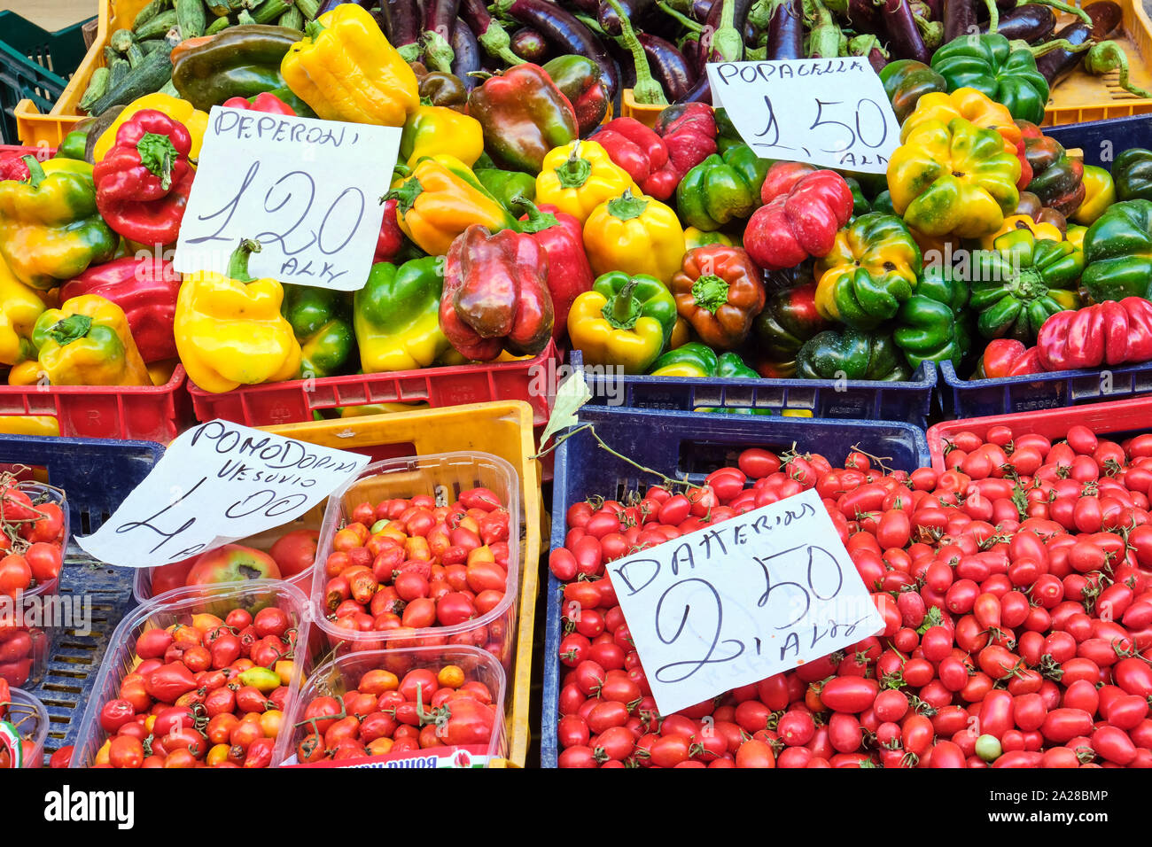 Cherry tomatoes and bell pepper for sale at a market in Naples, Italy Stock Photo