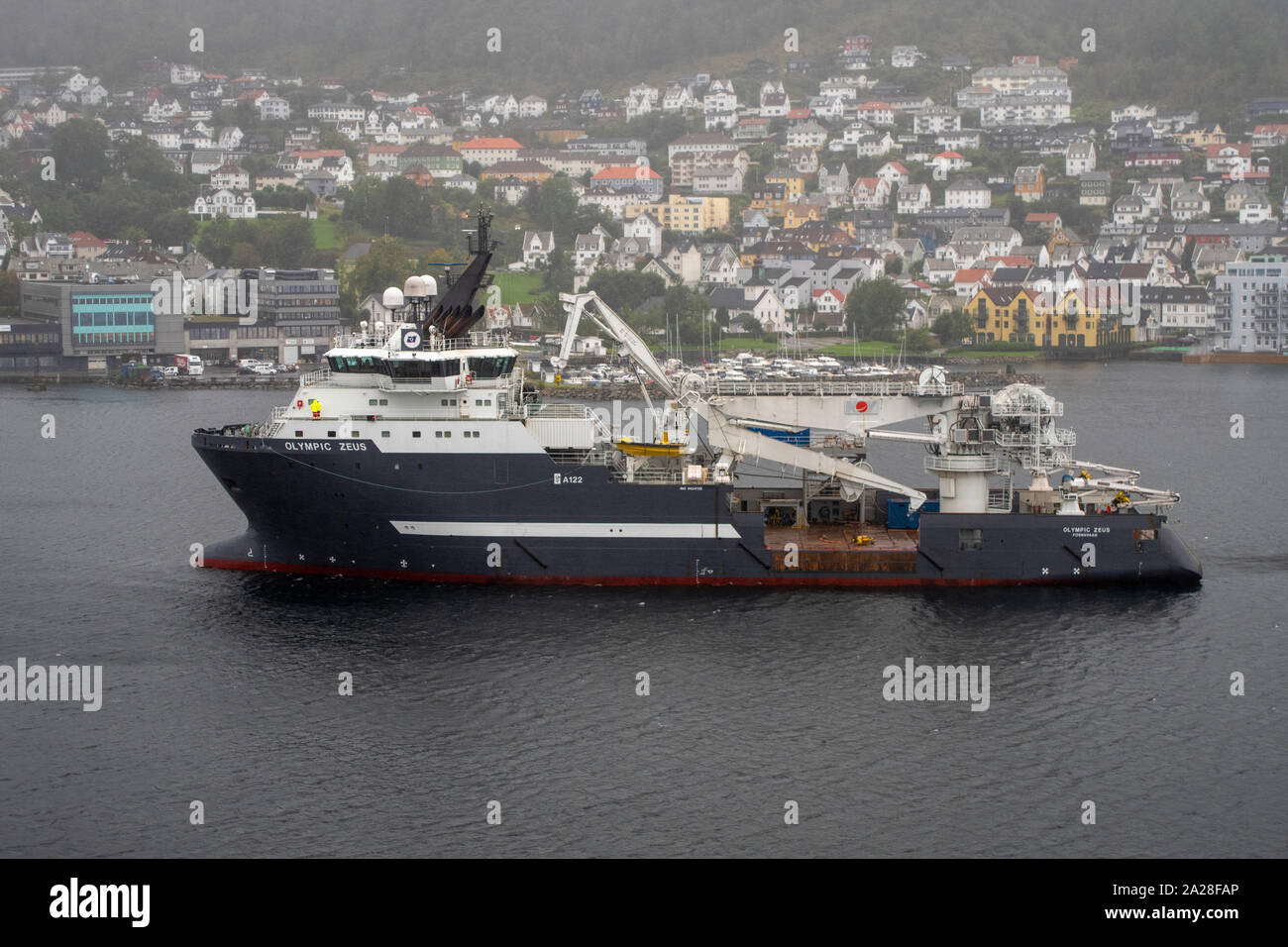 Offshore  anchor handling tug, supply and construction vessel in Bergen Harbour, Norway. Stock Photo