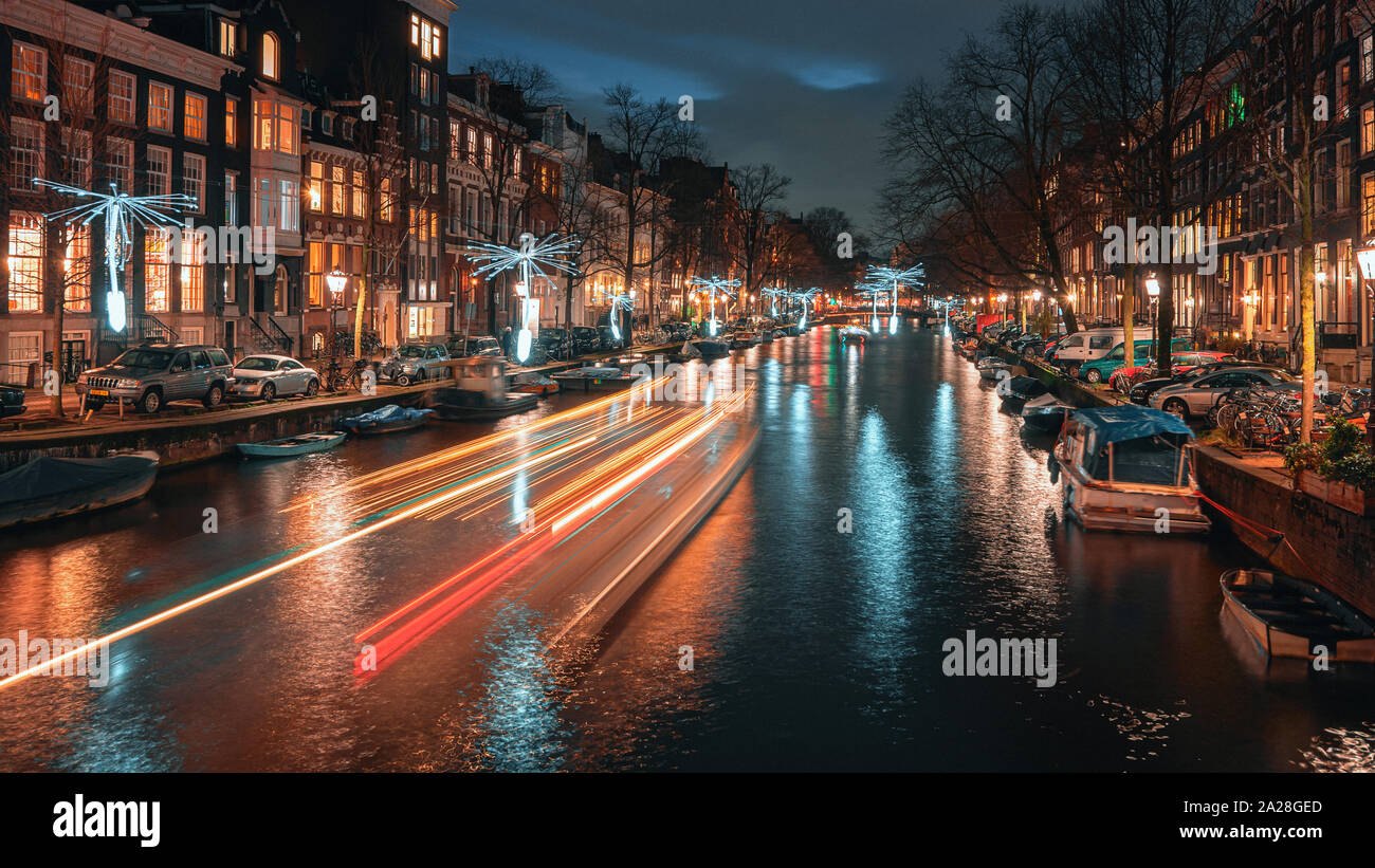 Amsterdam, Netherlands - January 14, 2019: Light Festival Amsterdam,  Wind driven propellers in white light above the Herengracht in the old town of A Stock Photo