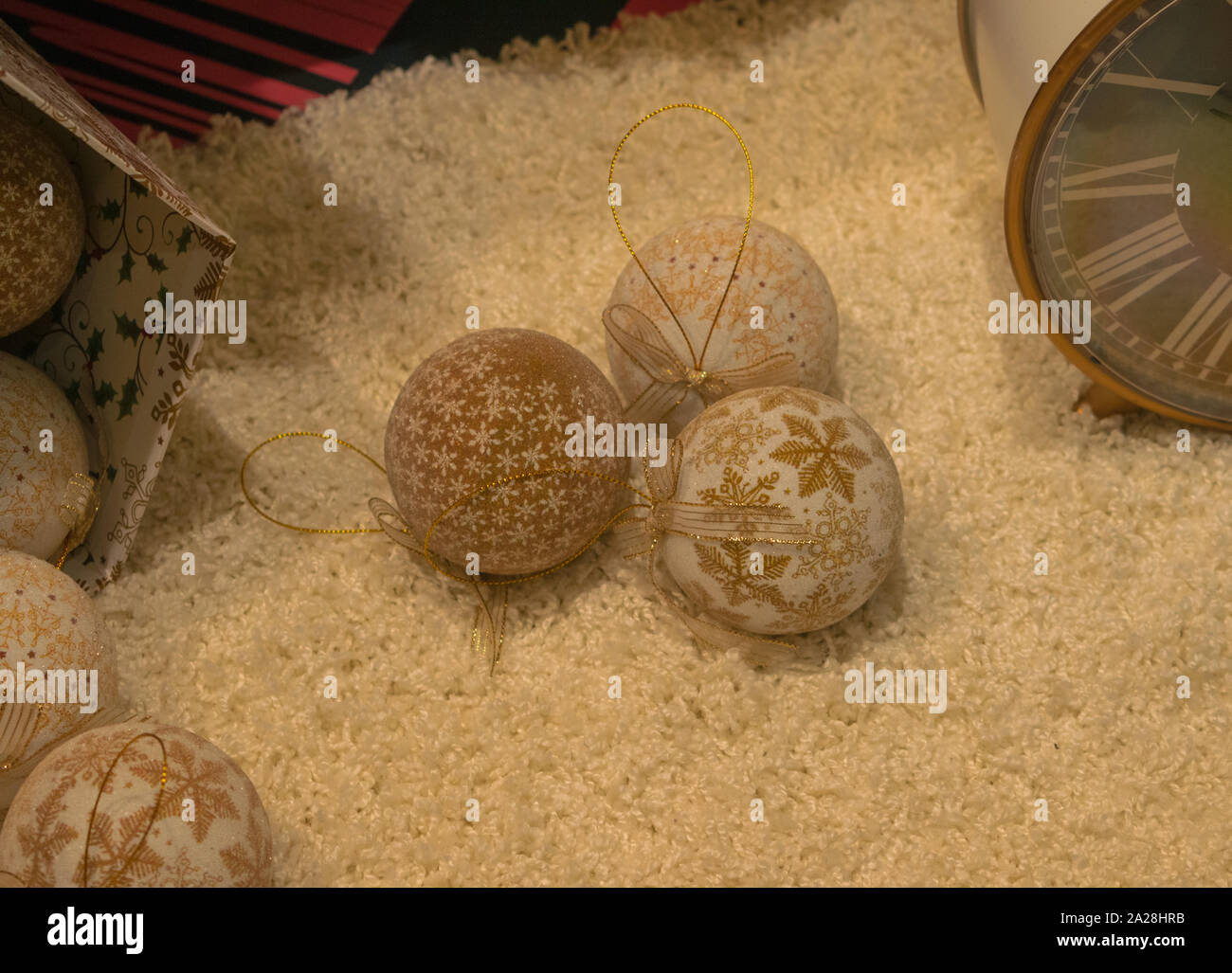 Christmas tree balls on a white carpet Stock Photo