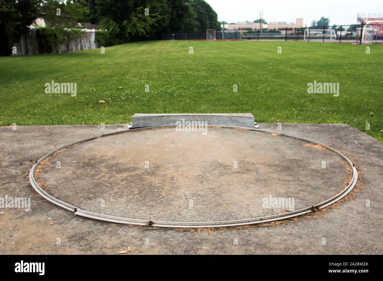 A local high schools shot put circle looking from behind out on to a