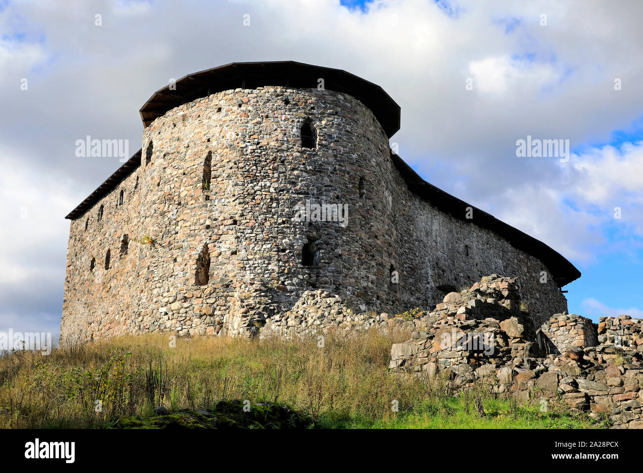 Medieval Raseborg Castle Ruins against sky. Raseborg Castle was built in 1370s on a rock that was surrounded by water at the time. Stock Photo