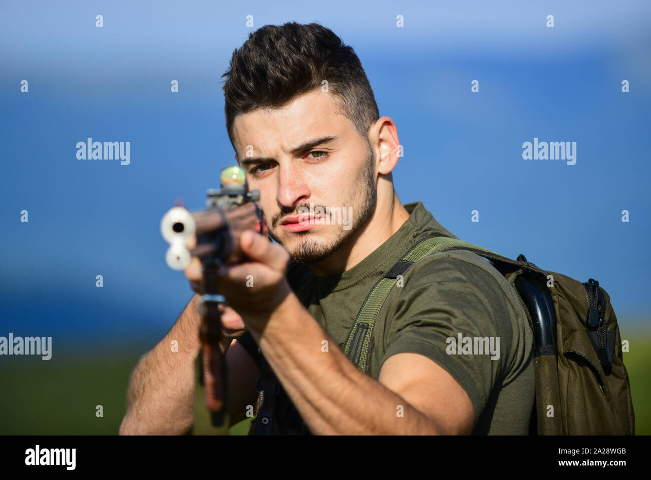 Trigger muscular man hold hi-res stock photography and images - Alamy