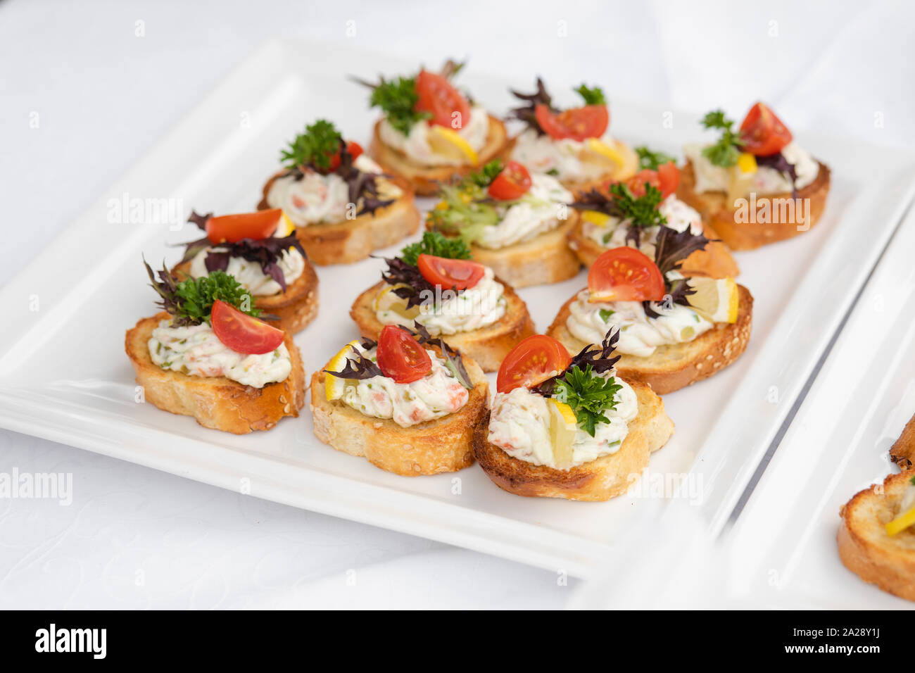 Close-up of wedding reception with tasty sandwiches and canapes made of ...