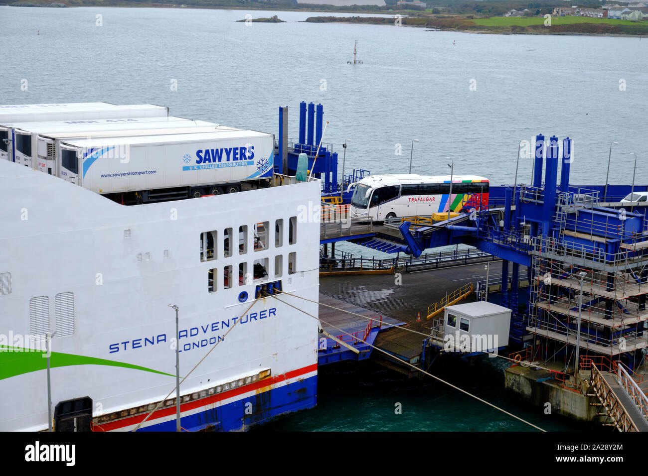English Trafalgar tour bus boarding a Stena Ferry in Holyhead Wales on ...