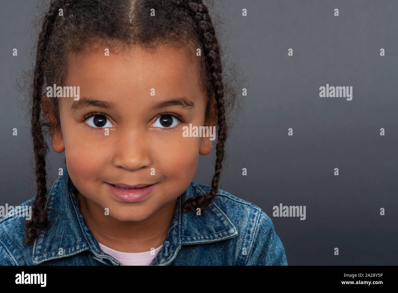 little girl with blue eyes and black hair