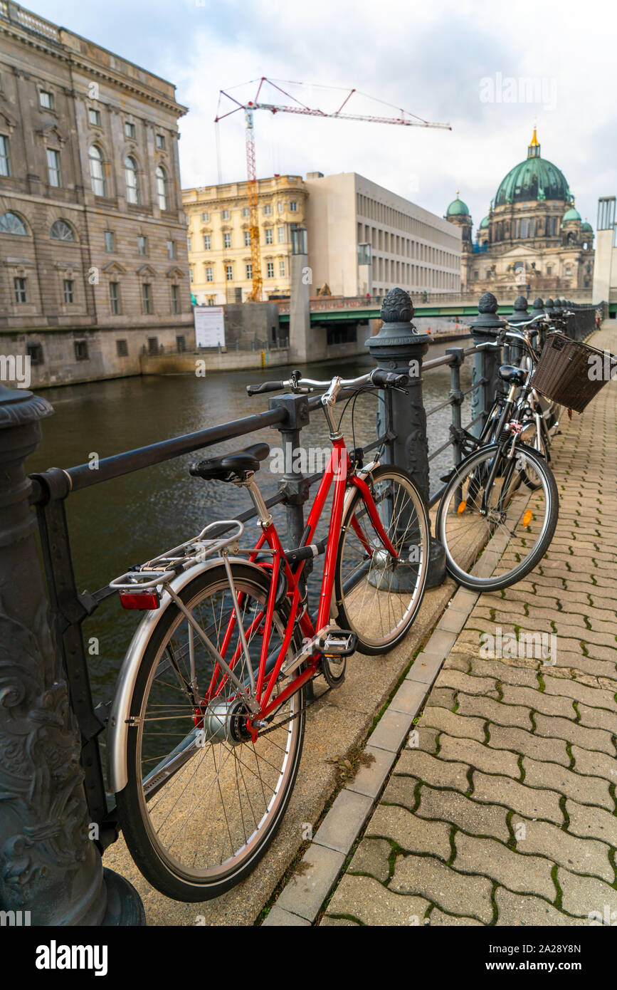 Bicycles by the River Spree near Berlin Cathedral, the Berliner Dom ...