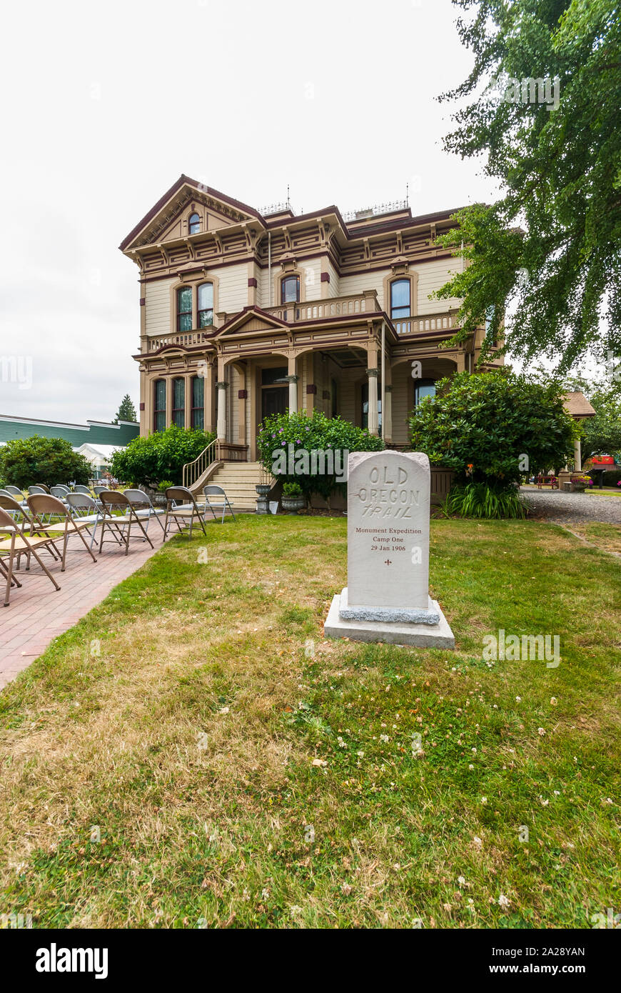 Meeker Mansion (built in 1886 in the Victorian style) and landscaping in Puyallup, Washington.  This view shows the Old Oregon Trail marker. Stock Photo