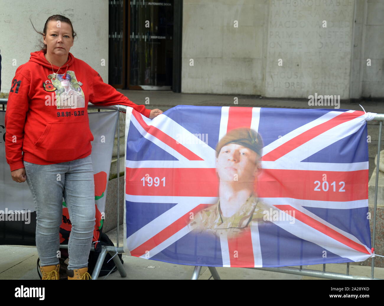 The mother of Daniel Wade, one of six soldiers who died when a bomb exploded under their Warrior vehicle in Afghanistan in 2012, outside the Conservative Party Conference, 2019, in Manchester, uk, on day 3. In 2013  a coroner said that significant steps had been taken to improve the army's Warrior vehicles in the wake of these deaths. Mrs Wade questions whether the vehicle was appropriate for the task when her son died. Daniel Wade was 20 years old when he was killed. Stock Photo