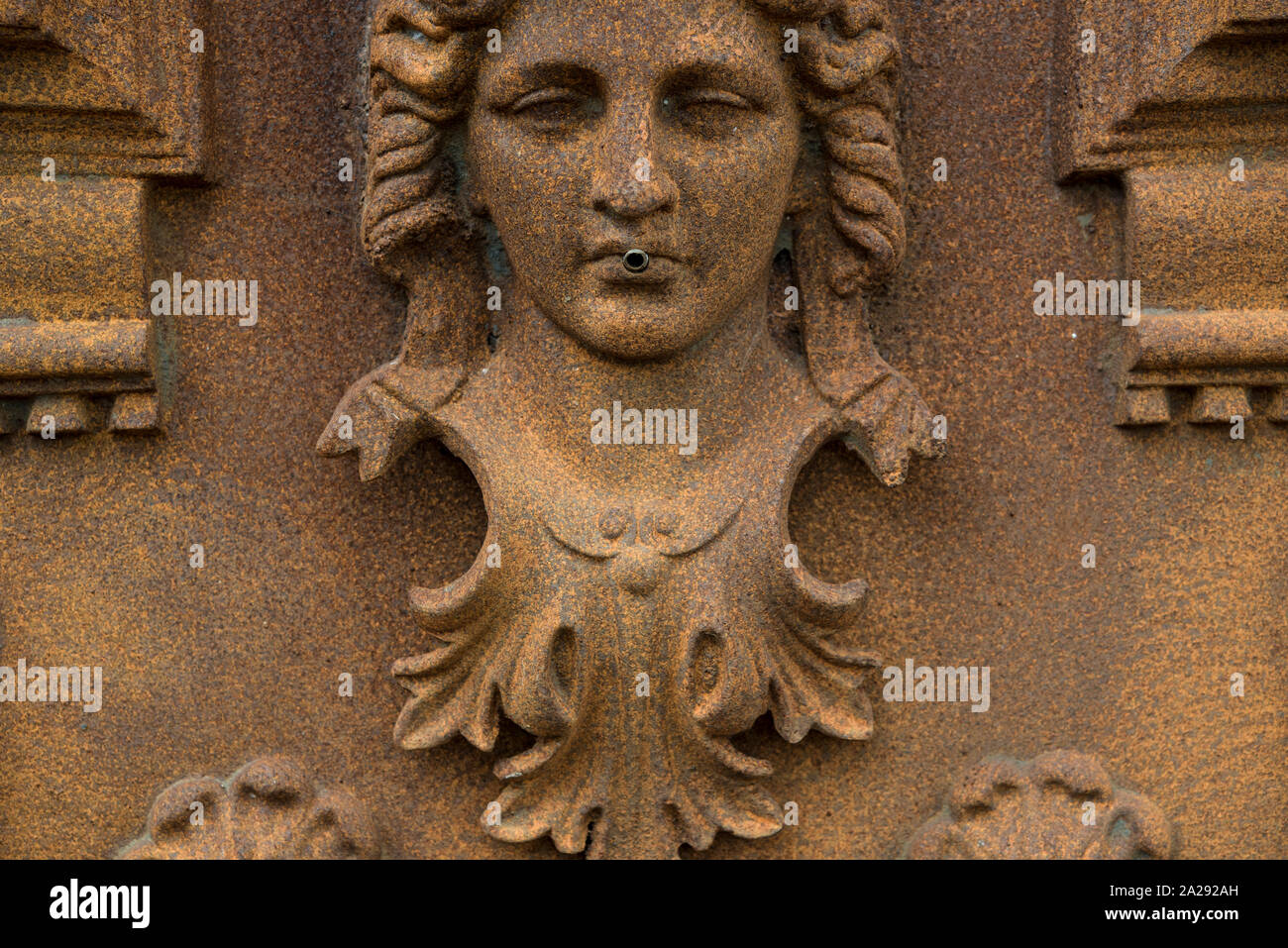 Baroque art in rusty fountain made of cast iron Stock Photo Alamy