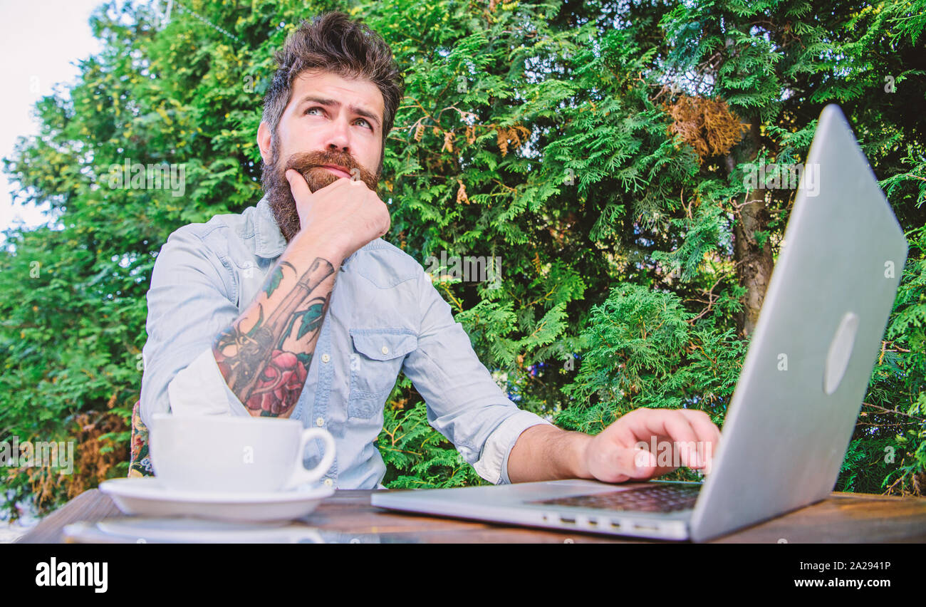 Keep on blogging. Bearded man blogging on popular social network. Amateur journalist blogging and writing articles. Blogging and advertising. Stock Photo