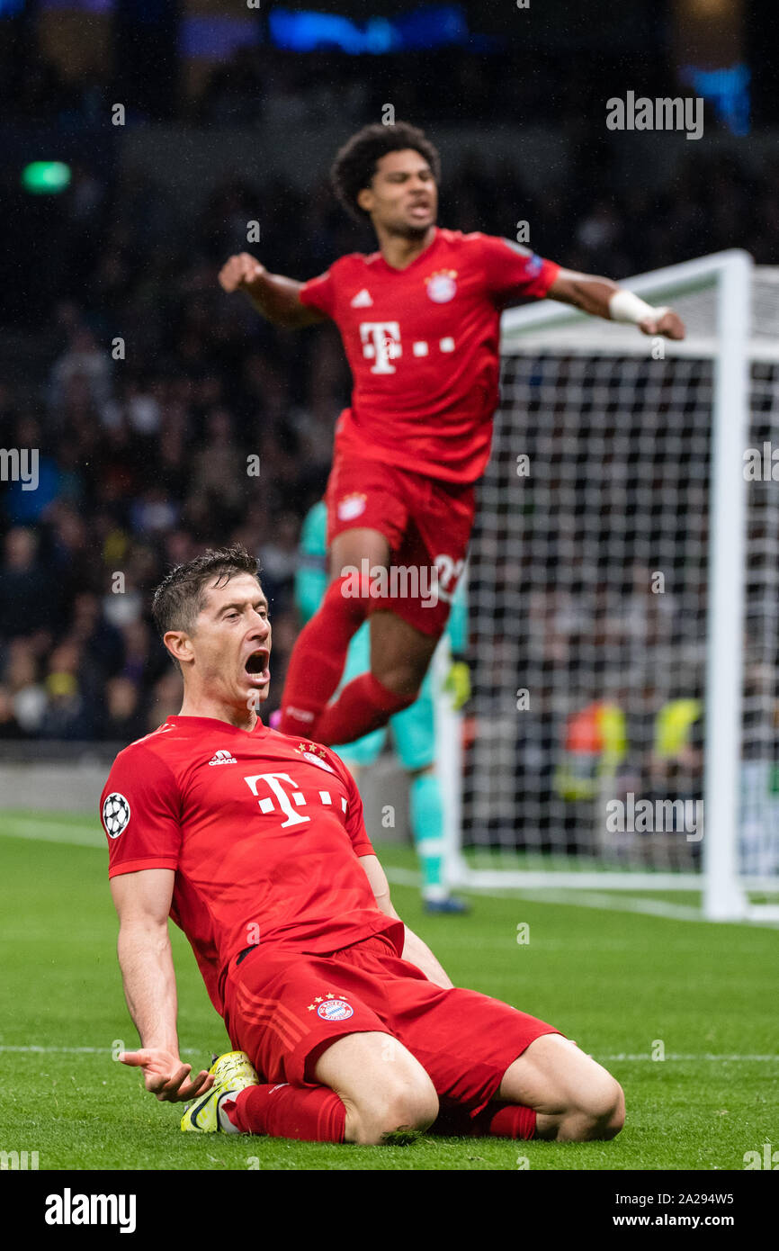 London, UK. 01st Oct, 2019. Soccer: Champions League, Tottenham Hotspur - FC Bayern Munich, Group stage, Group B, 2nd matchday at Tottenham Hotspur Stadium. Robert Lewandowski of FC Bayern Munich rejoices over his goal to 1:2. Serge Gnabry of FC Bayern Munich jumps into the air in the back. Credit: Matthias Balk/dpa/Alamy Live News Stock Photo