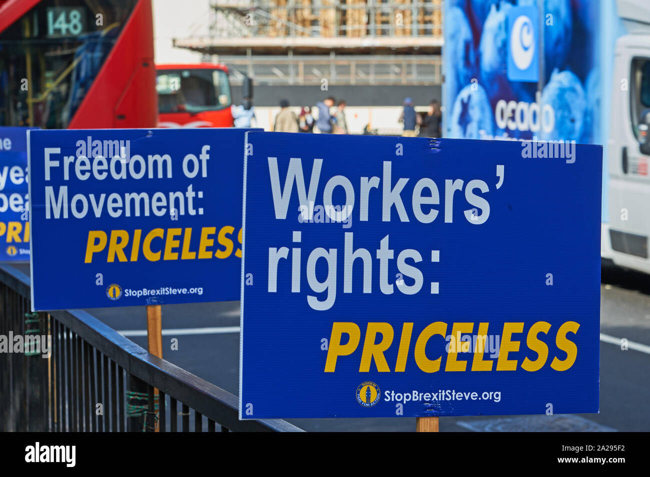 Placards supporting European membership fixed to railings outside the UK parliament buildings. Stock Photo