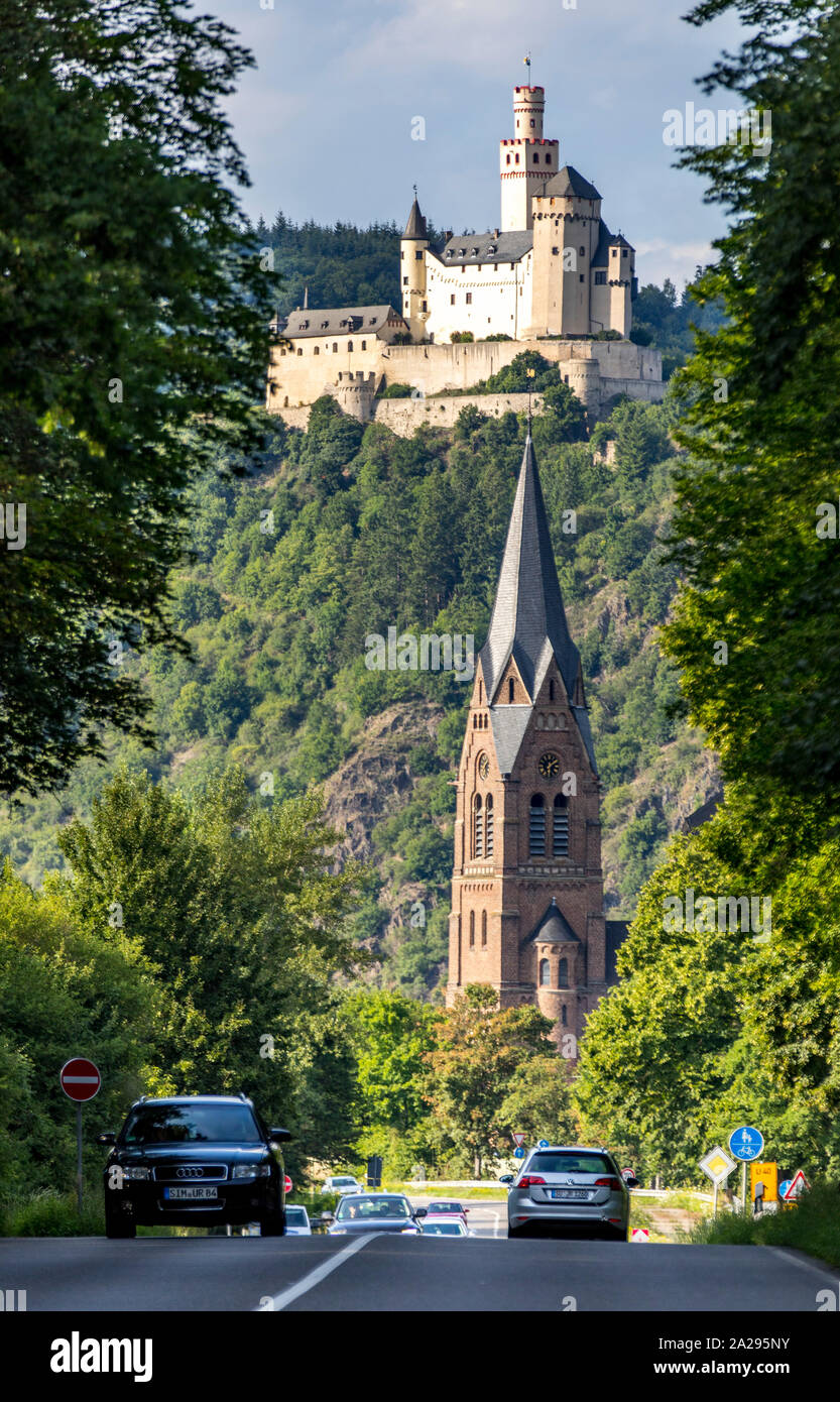 Marksburg Castle, near Braubach, in the Rheingau, in the UNESCO World Heritage Upper Middle Rhine Valley, St. Lambertus Church in SpayGermany Stock Photo