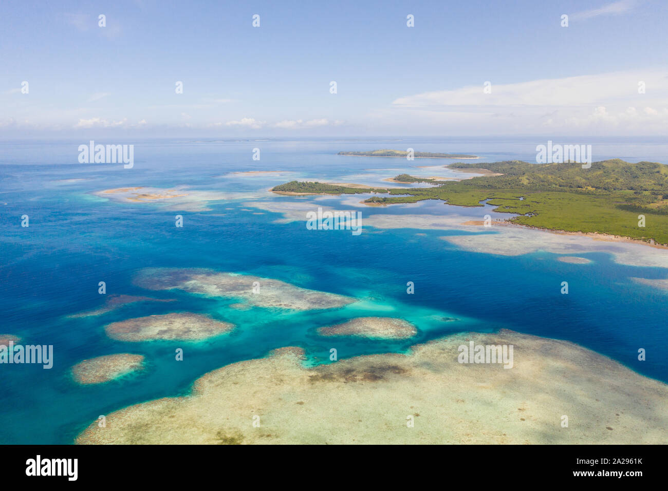 Bucas Grande Island, Philippines. Beautiful lagoons with atolls and islands, view from above. Seascape, nature of the Philippines. Stock Photo