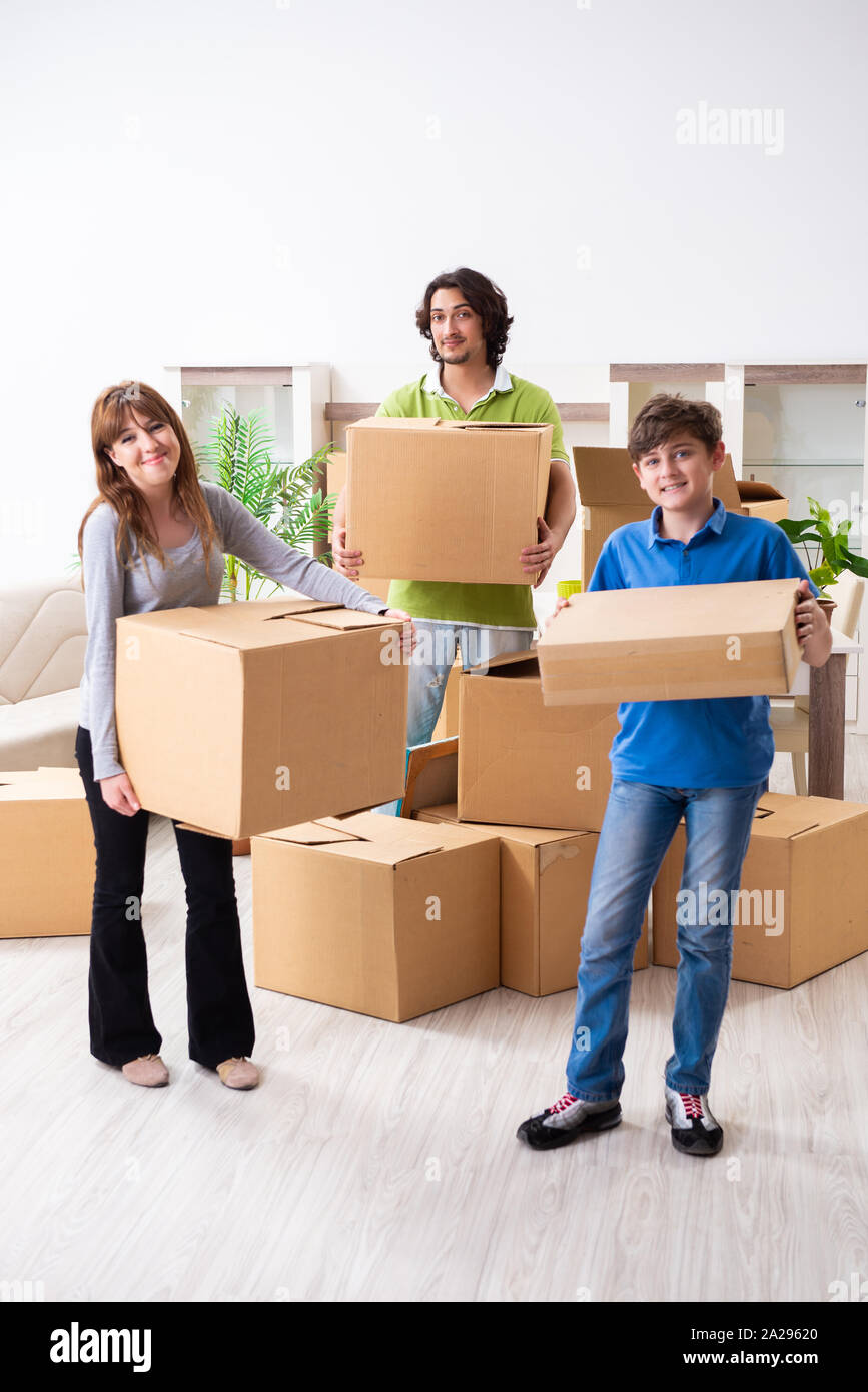 The young family moving to new flat Stock Photo - Alamy