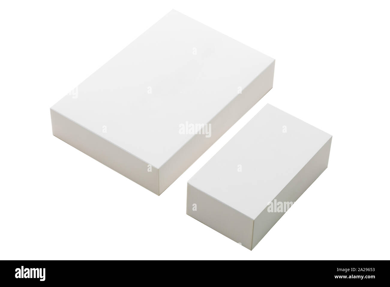 Two cardboard square boxes in two sizes, bigger box set on smaller one