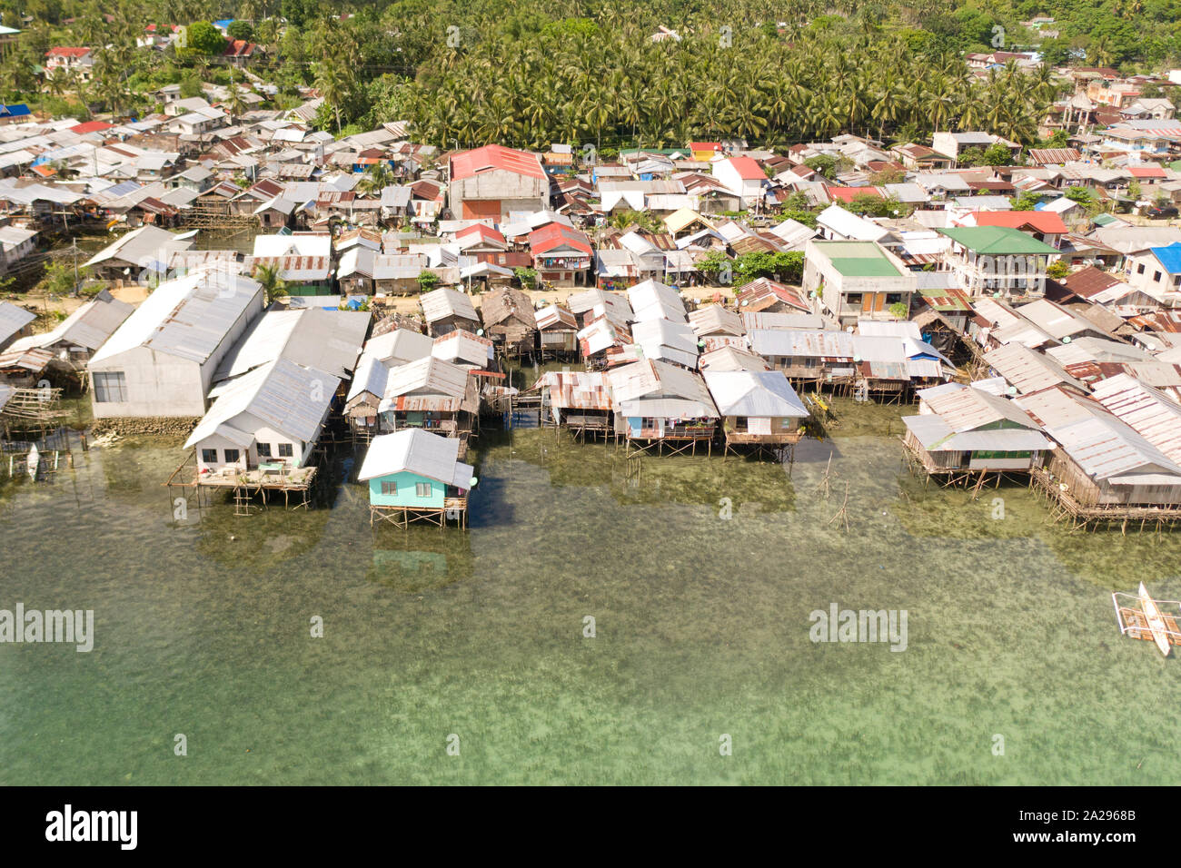 Dapa city, Siargao, Philippines. Houses on stilts, fishing village top ...