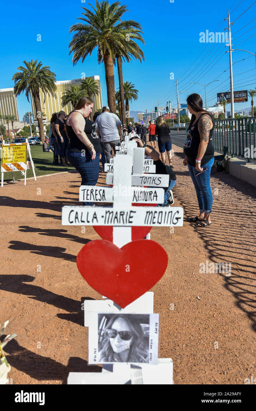 Las Vegas, NV, USA. 1st Oct, 2019. Friends and family of victims gather to receive Zanis Crosses For Losses on the Las Vegas strip on the two-year anniversary of the Las Vegas shooting in Las Vegas, Nevada on October 1, 2019. Credit: Damairs Carter/Media Punch/Alamy Live News Stock Photo