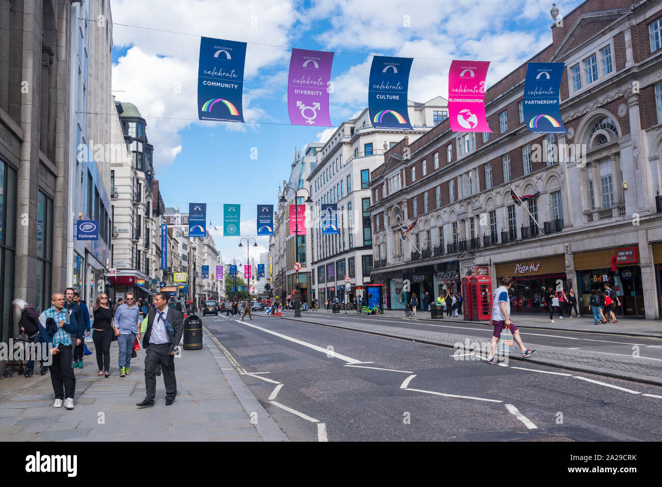 London, UK - August  2019: Strand (or the Strand), a major road street in the City of Westminster, Central London with people and tourist walking Stock Photo