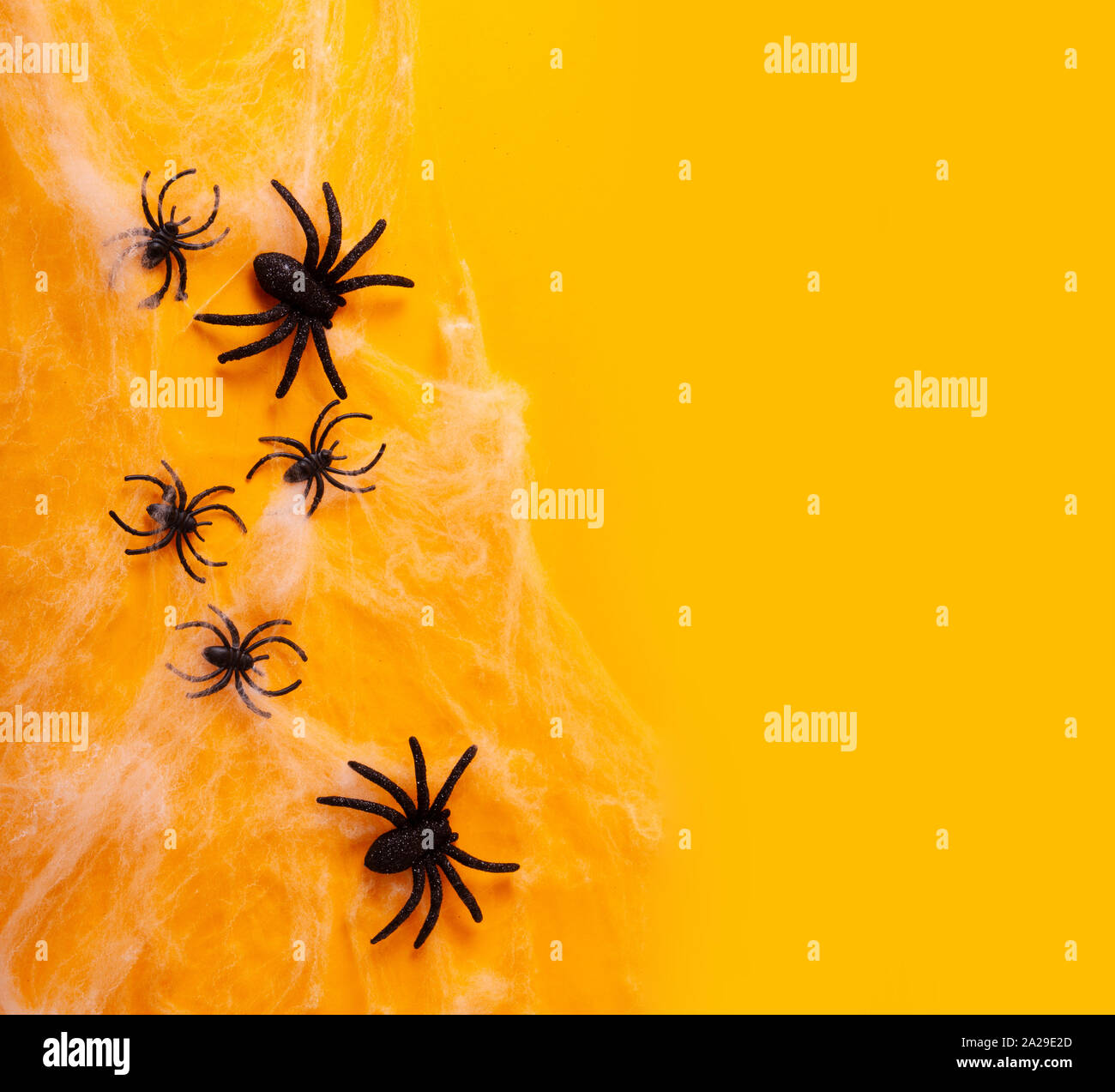 Halloween scene on orange background Stock Photo - Alamy