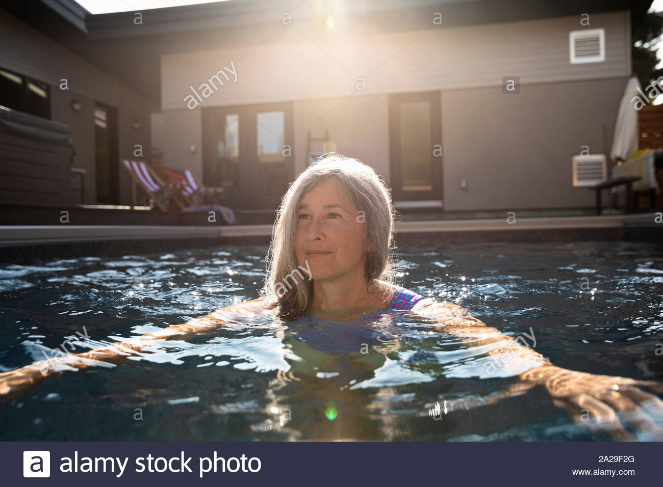 Senior woman swimming pool hi-res stock photography and images - Alamy