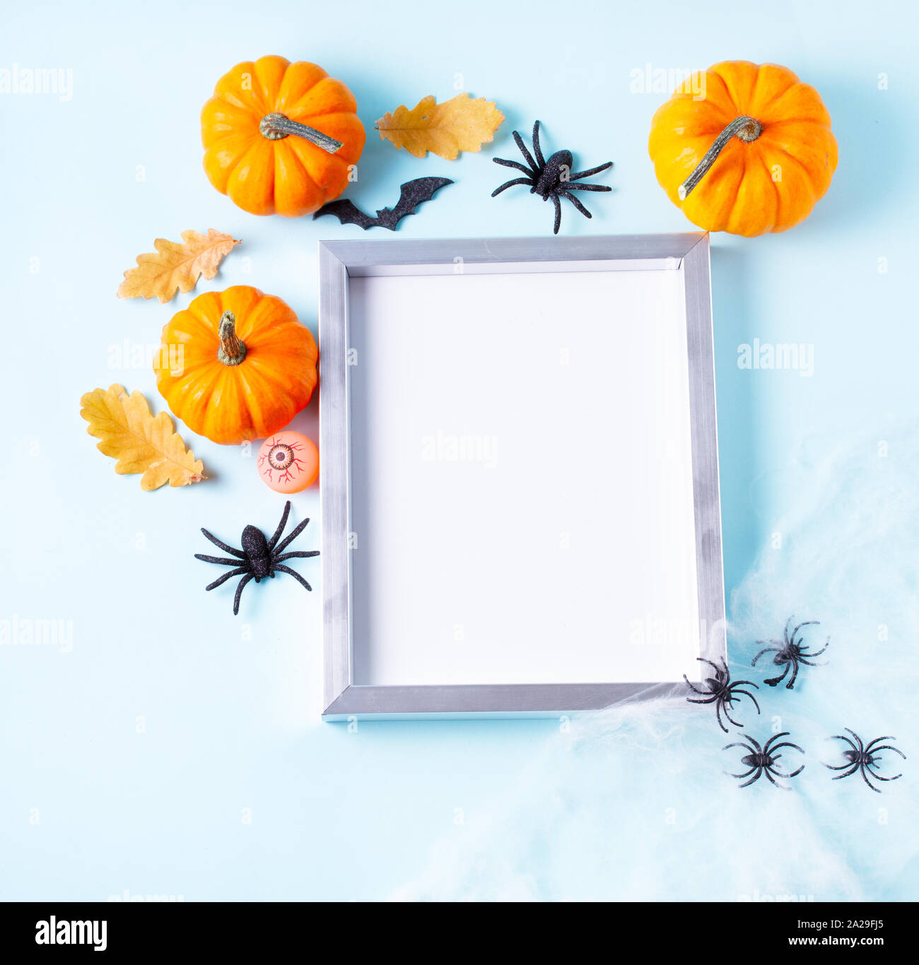 Halloween scene on orange background Stock Photo - Alamy