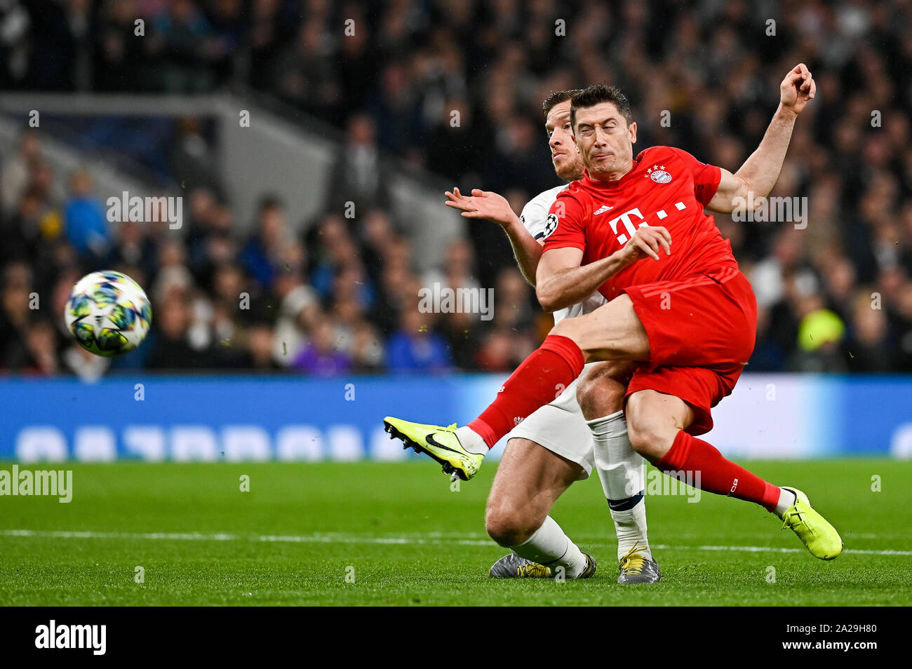 Jan Vertonghen from Tottenham Hotspur (L) and Robert Lewandowski from Bayern Munich (R) are seen in action during the UEFA Champions League (Group B) match between Tottenham Hotspur and Bayern Munich.(Final score; Tottenham Hotspur 2:7 Bayern Munich) Stock Photo