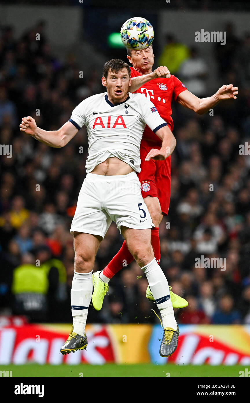 Jan Vertonghen from Tottenham Hotspur (L) and Robert Lewandowski from Bayern Munich (R) are seen in action during the UEFA Champions League (Group B) match between Tottenham Hotspur and Bayern Munich.(Final score; Tottenham Hotspur 2:7 Bayern Munich) Stock Photo
