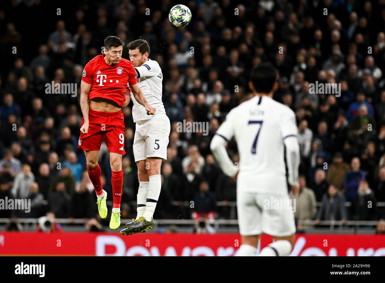 Robert Lewandowski from Bayern Munich (L) and Jan Vertonghen from Tottenham Hotspur (R) are seen in action during the UEFA Champions League (Group B) match between Tottenham Hotspur and Bayern Munich.(Final score; Tottenham Hotspur 2:7 Bayern Munich) Stock Photo