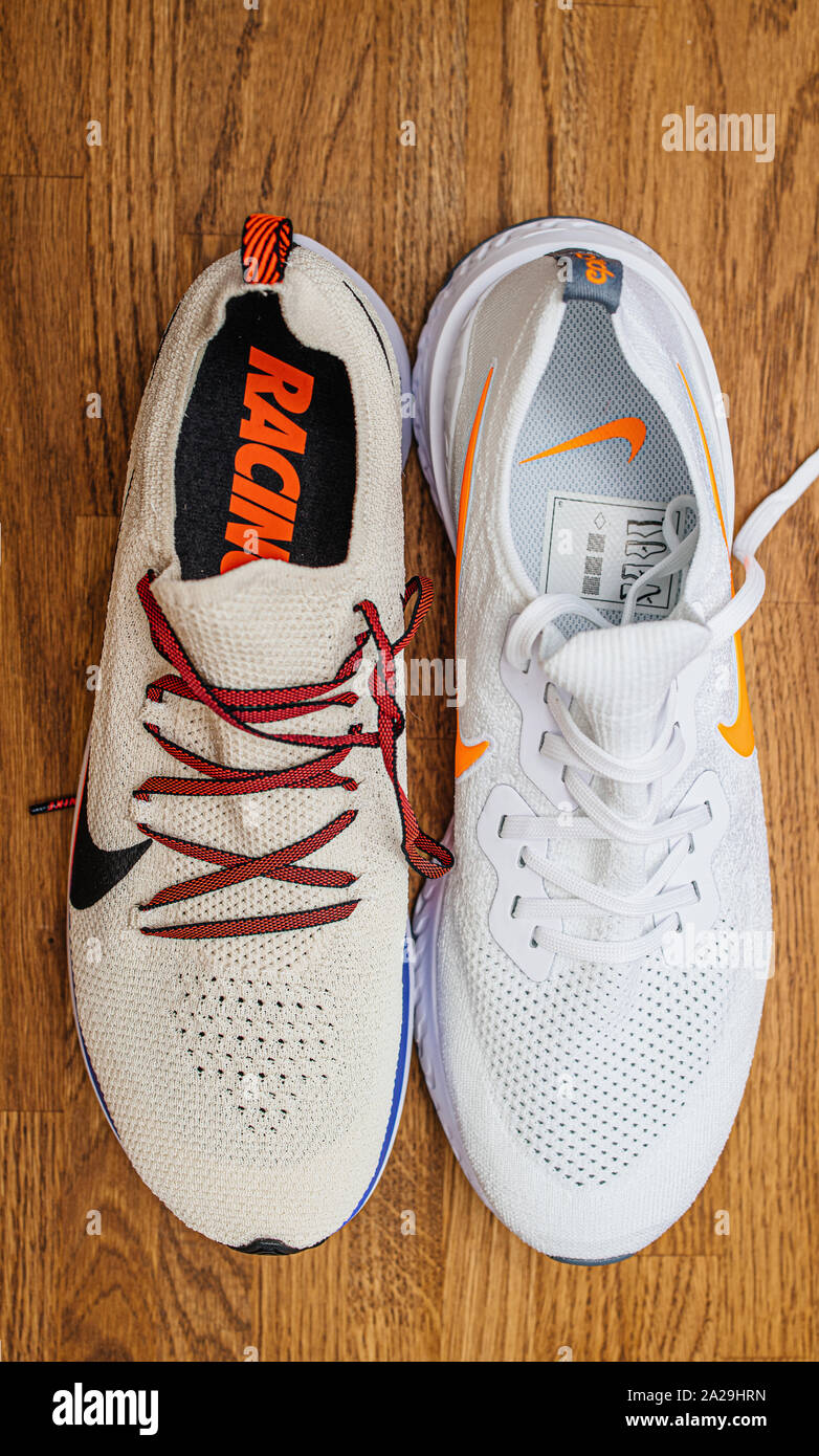 Paris, France - Jul 8, 2019: Two new professional Nike Zoom Fly Flyknit and Zoom  Fly SP Fast running sport shoe on wooden floor Stock Photo - Alamy
