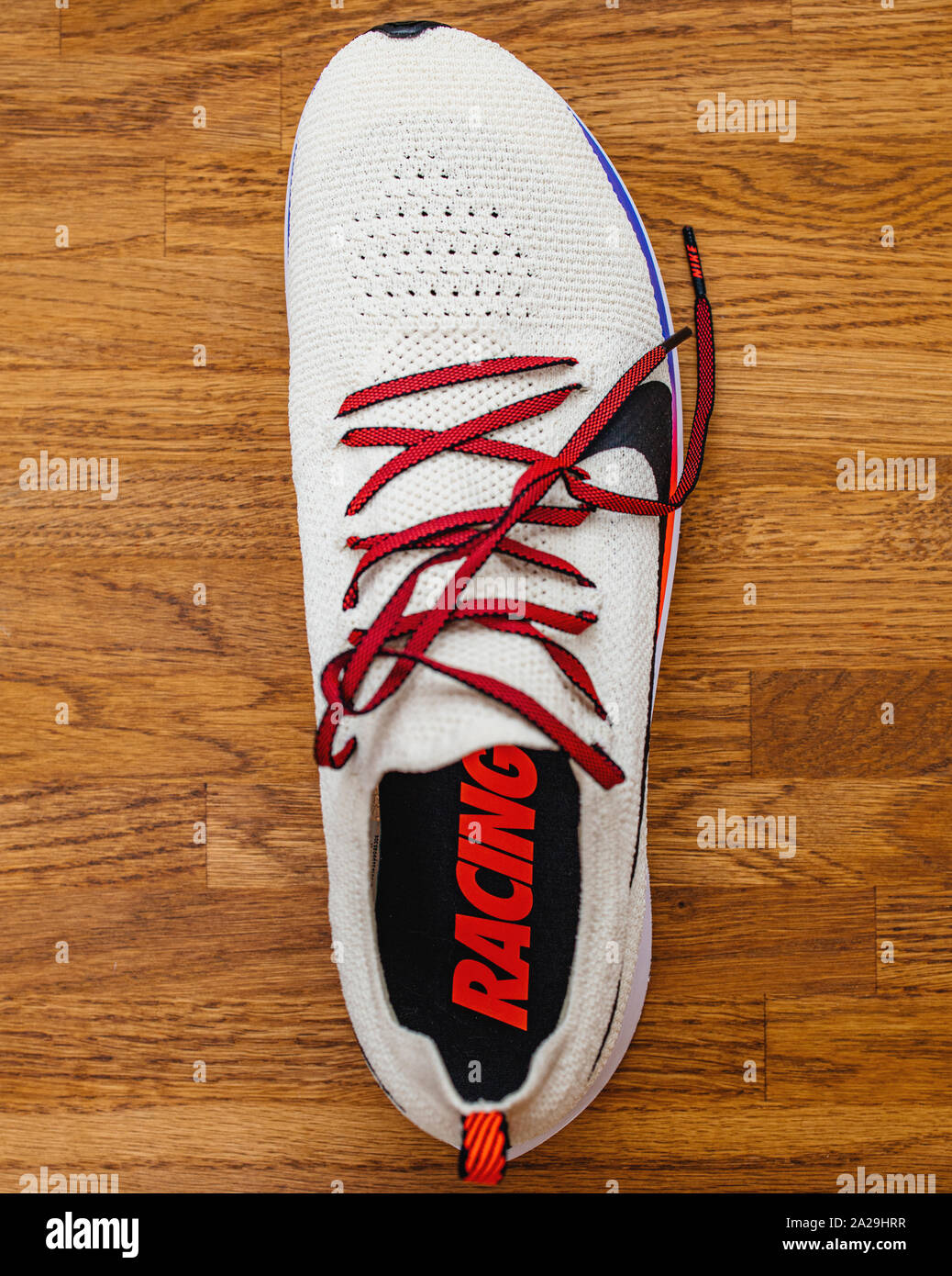 Paris, France - Jul 8, 2019: New professional Nike Zoom Fly Flyknit running  sport shoe on wooden floor Stock Photo - Alamy