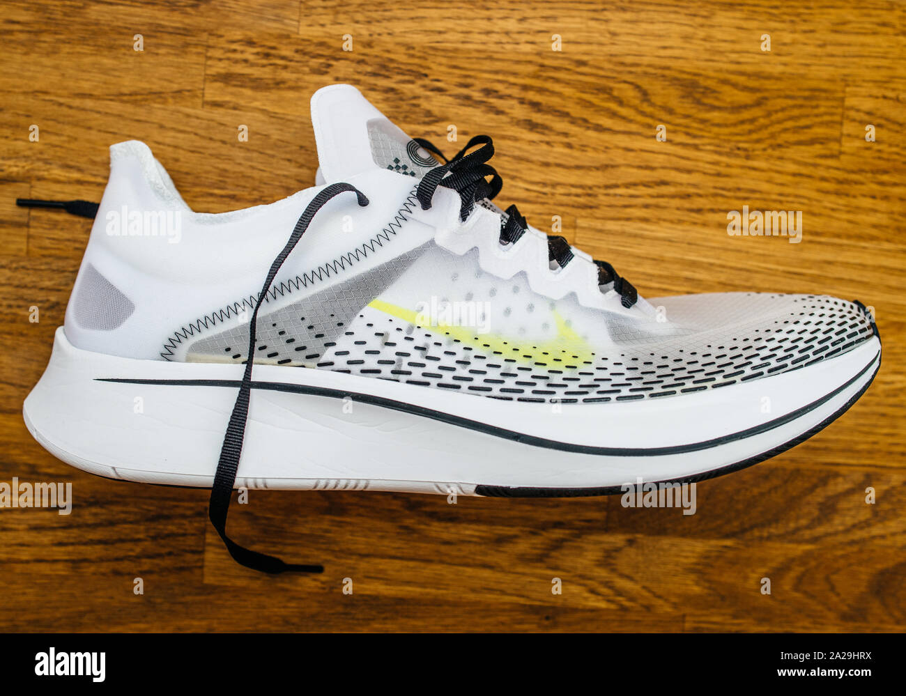 Paris, France - Jul 8, 2019: New professional Nike Zoom Fly SP Fast running  sport shoe on wooden floor Stock Photo - Alamy