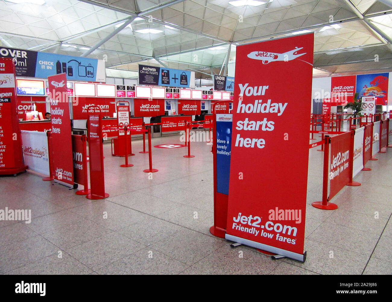 Jet2.com airline check in desk seen at London Stansted Airport Stock ...