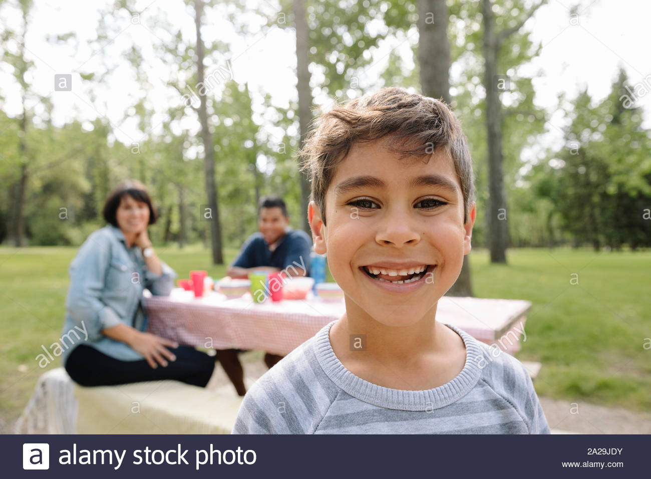 Boy smiling to camera hi-res stock photography and images - Alamy