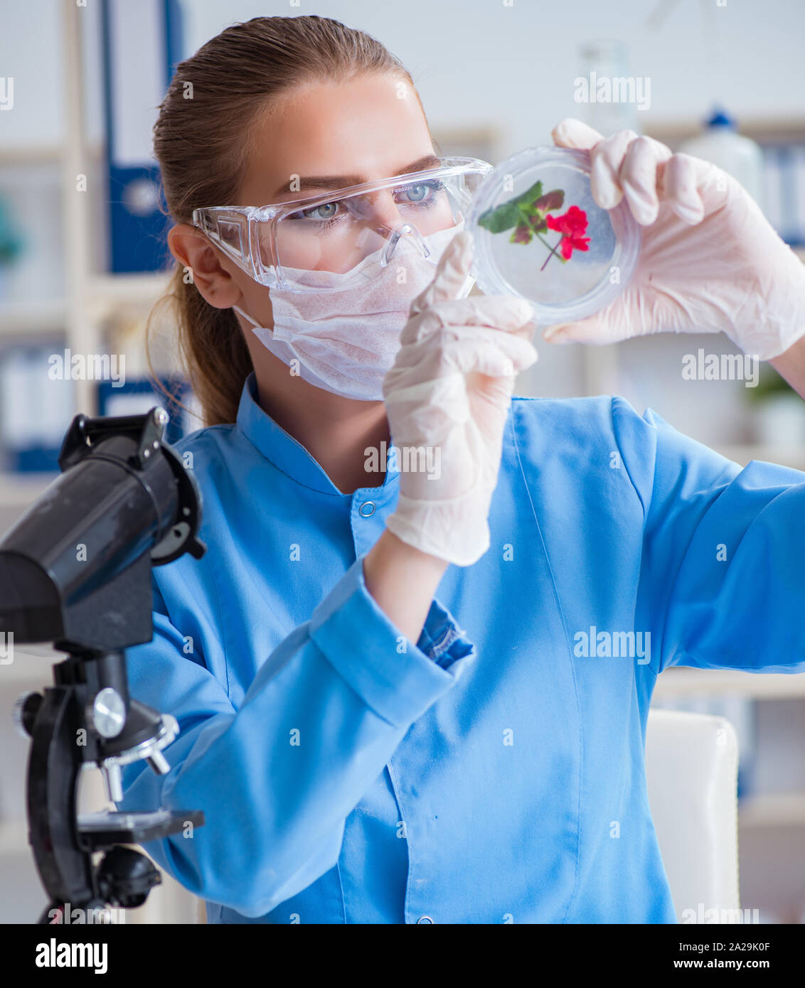Female scientist researcher conducting an experiment in a laboratory ...