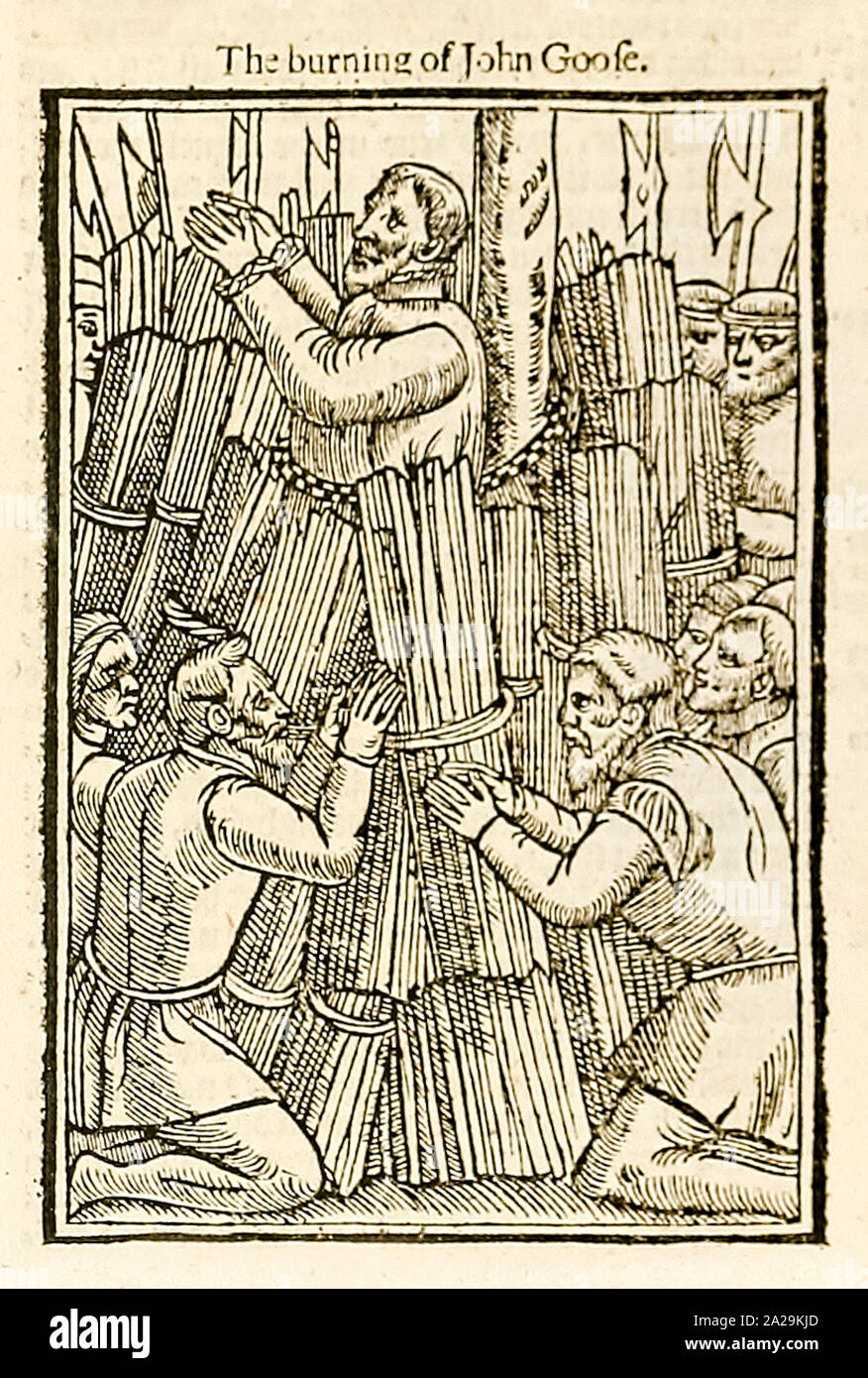 ‘The burning of John Goofe ’ woodcut depicting his Martyrdom by being burnt at the strake for heresy at Tower Hill in 1473 after being fed by the Sheriff. Photograph of woodcut from a 1631 edition of Foxe's Book of Martyrs by John Foxe (1516-1587) first published in 1563. Credit: Private Collection / AF Fotografie Stock Photo